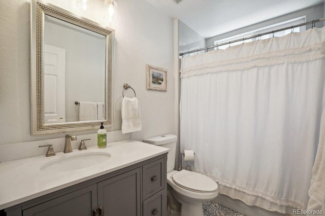 3102 Fox Sedge Pl, Highlands Ranch, CO 80126 - full bath with toilet, vanity, and a textured wall