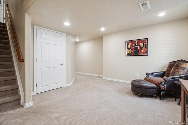 3102 Fox Sedge Pl, Highlands Ranch, CO 80126 - living area featuring light carpet, stairway, baseboards, and recessed lighting