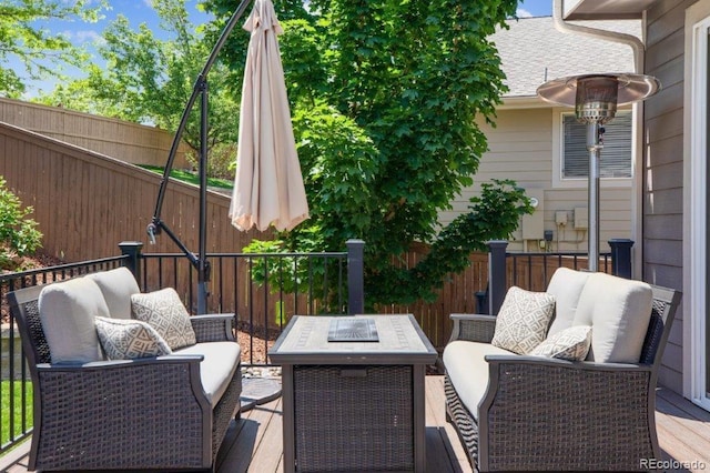 3102 Fox Sedge Pl, Highlands Ranch, CO 80126 - view of patio with an outdoor living space with a fire pit and a wooden deck