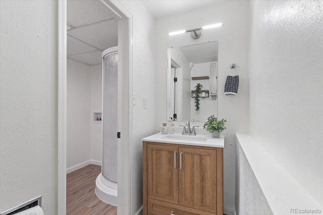 10895 W Bowles Pl, Littleton, CO 80127 - bathroom featuring vanity and wood finished floors