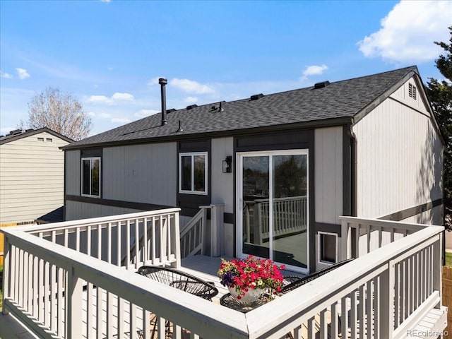 10895 W Bowles Pl, Littleton, CO 80127 - rear view of property with a shingled roof