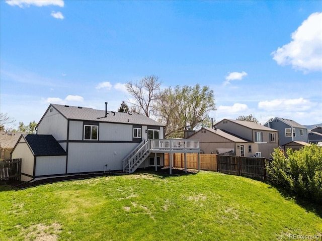 10895 W Bowles Pl, Littleton, CO 80127 - rear view of property with stairway, a wooden deck, and a residential view