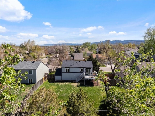 10895 W Bowles Pl, Littleton, CO 80127 - aerial view of residential area featuring a mountainous background