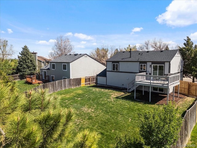 10895 W Bowles Pl, Littleton, CO 80127 - rear view of house with a deck and stairway