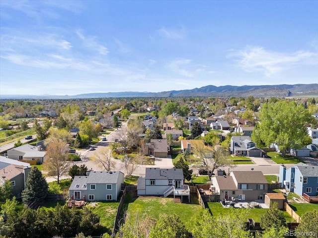 10895 W Bowles Pl, Littleton, CO 80127 - aerial view of residential area featuring a mountain backdrop