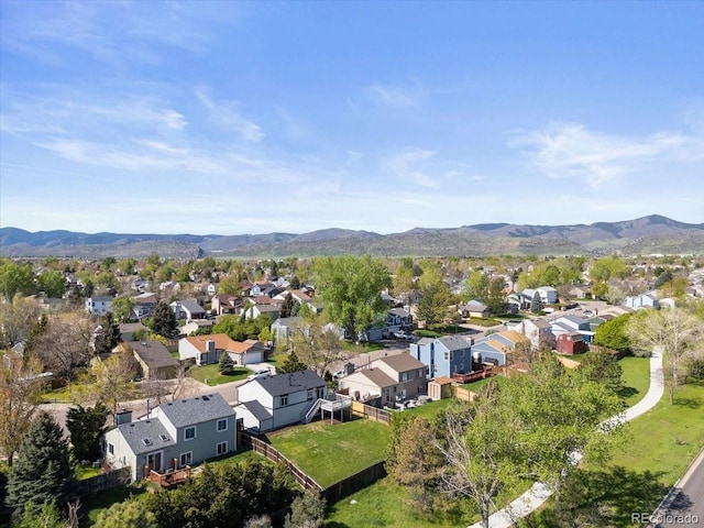 10895 W Bowles Pl, Littleton, CO 80127 - aerial view of property and surrounding area with nearby suburban area and a mountainous background