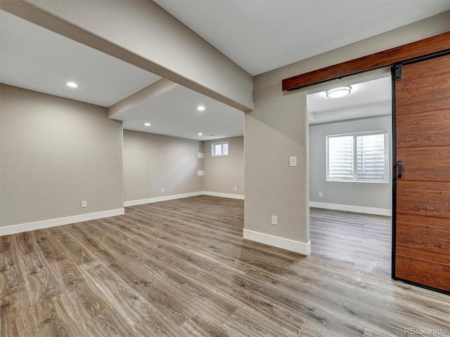 15915 E Mercer Cir, Aurora, CO 80013 - unfurnished room with wood finished floors, recessed lighting, and healthy amount of natural light