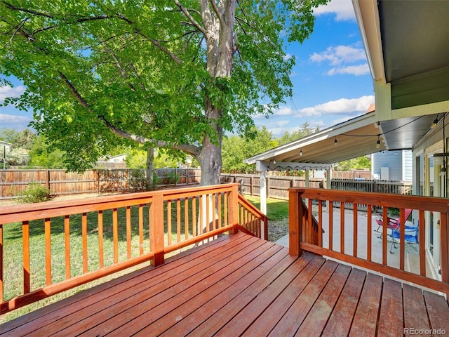 15915 E Mercer Cir, Aurora, CO 80013 - wooden deck with a fenced backyard