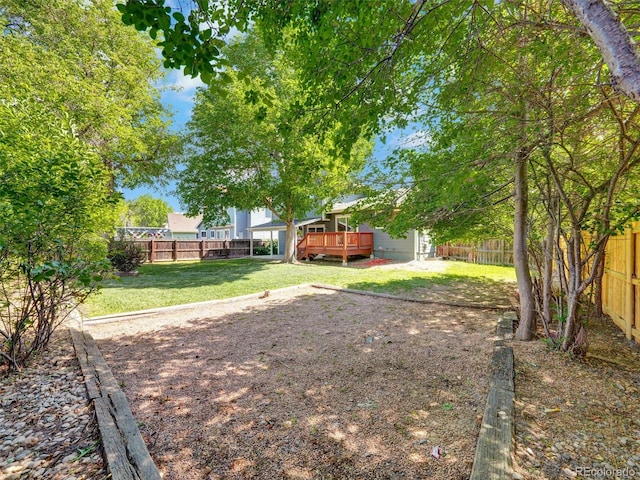 15915 E Mercer Cir, Aurora, CO 80013 - fenced backyard with a wooden deck