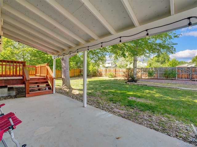 15915 E Mercer Cir, Aurora, CO 80013 - fenced backyard featuring a patio and a wooden deck