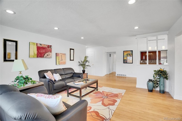 7819 Tejon St, Denver, CO 80221 - living room with light wood-type flooring and recessed lighting