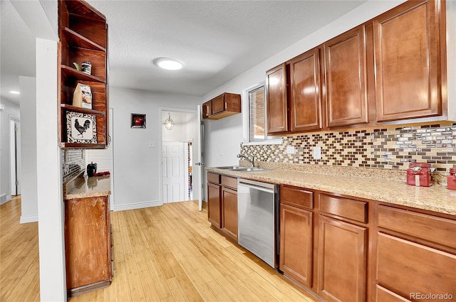 7819 Tejon St, Denver, CO 80221 - kitchen with dishwasher, open shelves, light wood-type flooring, decorative backsplash, and light stone counters