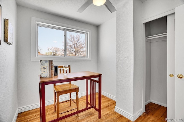 7819 Tejon St, Denver, CO 80221 - home office with light wood-style flooring and a ceiling fan