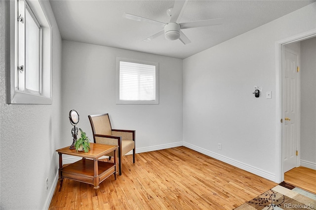7819 Tejon St, Denver, CO 80221 - living area with light wood finished floors and ceiling fan