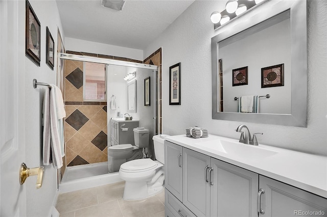 7819 Tejon St, Denver, CO 80221 - bathroom with vanity, a stall shower, tile patterned floors, and a textured ceiling