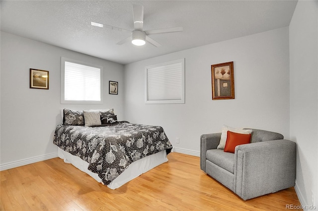 7819 Tejon St, Denver, CO 80221 - bedroom featuring wood finished floors and ceiling fan