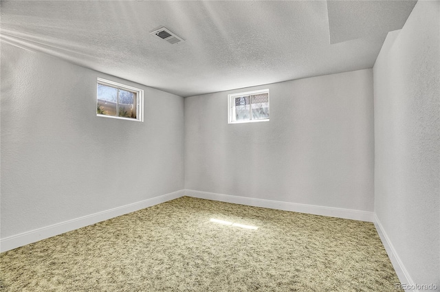 7819 Tejon St, Denver, CO 80221 - below grade area featuring carpet flooring and a textured ceiling