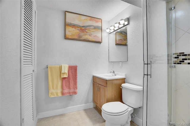 7819 Tejon St, Denver, CO 80221 - bathroom with a closet, vanity, a stall shower, tile patterned flooring, and a textured ceiling
