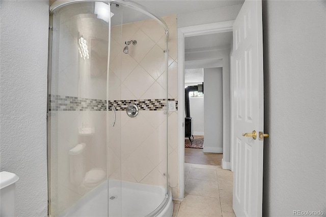 7819 Tejon St, Denver, CO 80221 - full bathroom featuring a shower stall and tile patterned flooring