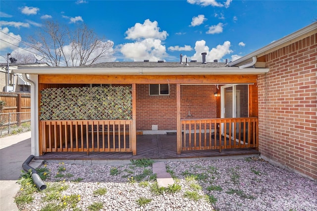 7819 Tejon St, Denver, CO 80221 - rear view of property featuring a deck and brick siding