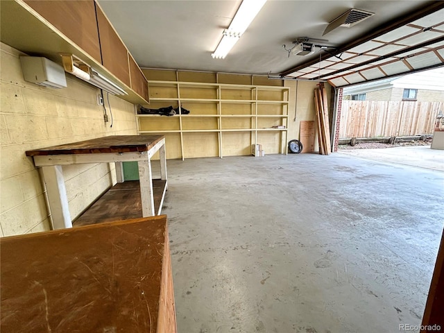 660 Wolff St, Denver, CO 80204 - garage featuring a garage door opener