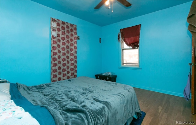 7261 Magnolia St, Commerce City, CO 80022 - bedroom featuring a ceiling fan, baseboards, and wood finished floors
