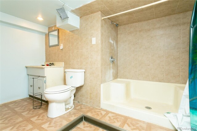 full bathroom with shower / tub combo with curtain, vanity, tile walls, and toilet