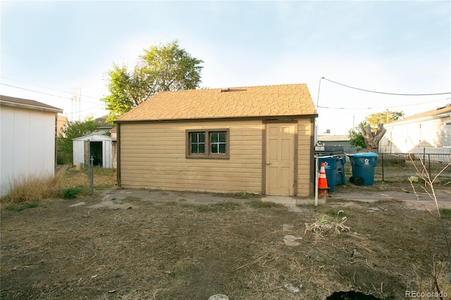 7261 Magnolia St, Commerce City, CO 80022 - view of shed featuring fence