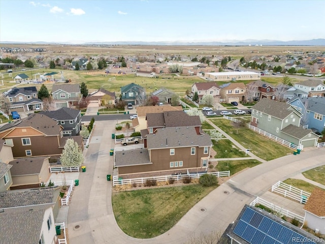 drone / aerial view with a mountain view and a residential view