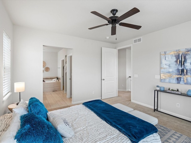 bedroom featuring baseboards, a ceiling fan, multiple windows, and visible vents