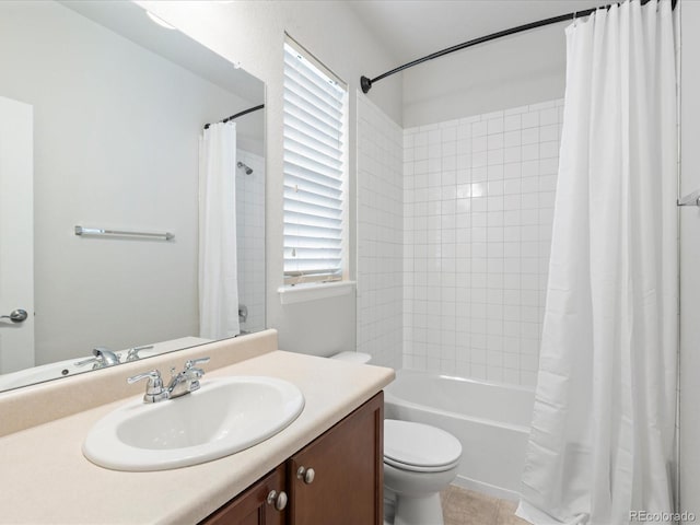 full bath with tile patterned floors, shower / bath combo, vanity, and toilet