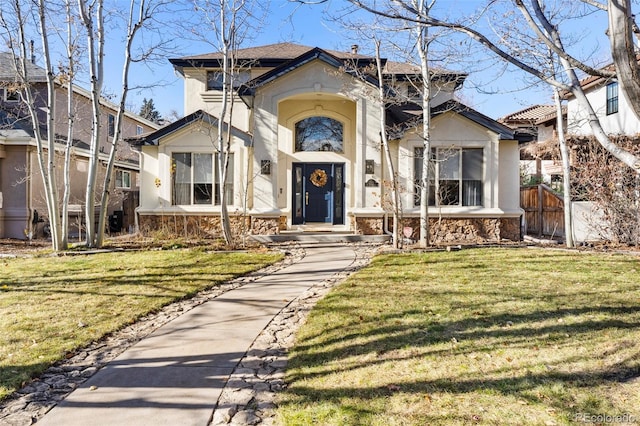 view of front facade with a front yard