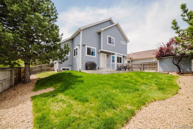 15389 E 99th Way, Commerce City, CO 80022 - back of house with a patio