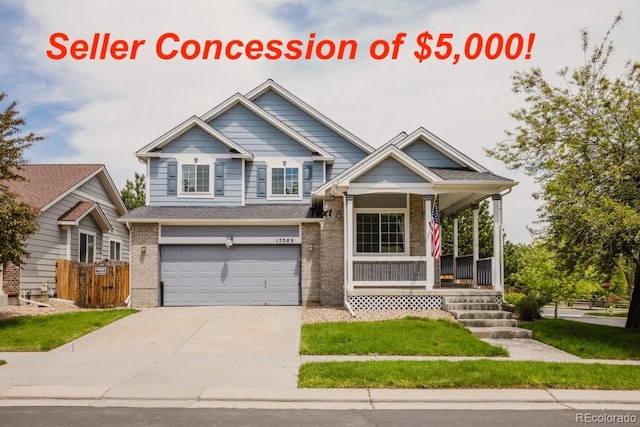 15389 E 99th Way, Commerce City, CO 80022 - view of front of house featuring a garage, a porch, concrete driveway, and brick siding