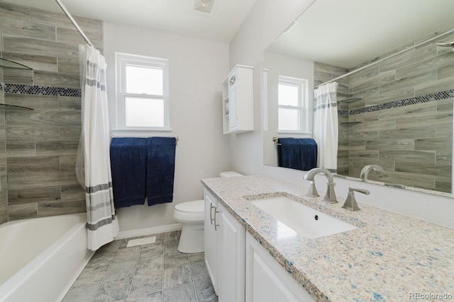 15389 E 99th Way, Commerce City, CO 80022 - full bathroom featuring vanity, plenty of natural light, toilet, and shower / bath combo