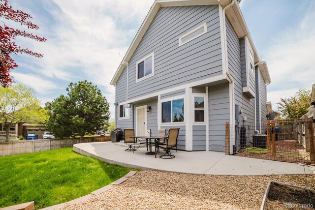 15389 E 99th Way, Commerce City, CO 80022 - rear view of property featuring a patio area and cooling unit