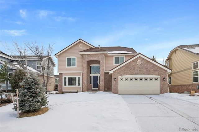 front of property with a garage