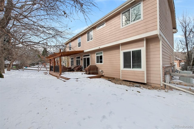 view of snow covered house