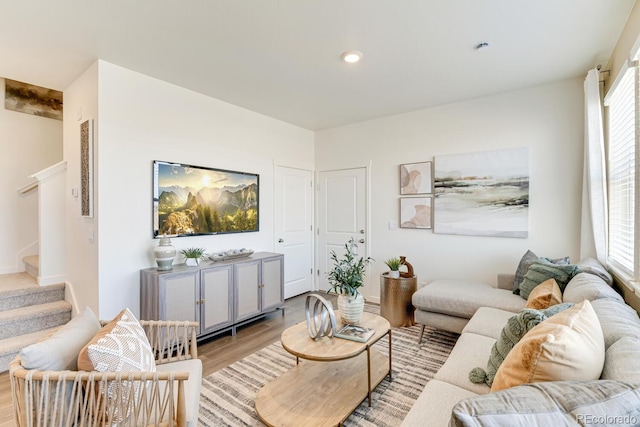 18726 E 99th Ave, Commerce City, CO 80022 - living room featuring light wood-type flooring, plenty of natural light, stairs, and recessed lighting