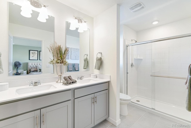 18726 E 99th Ave, Commerce City, CO 80022 - ensuite bathroom with double vanity and a shower stall
