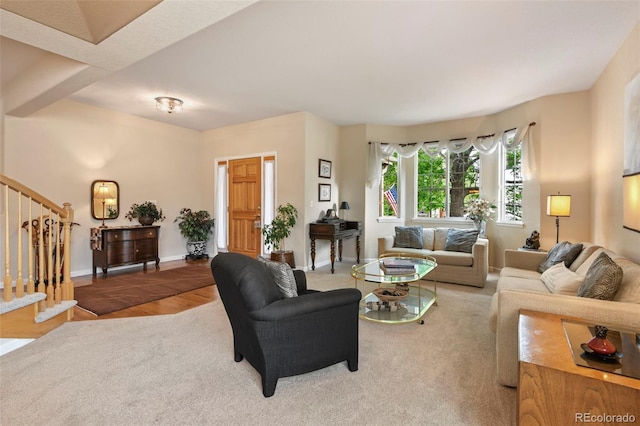 15962 W 70th Dr, Arvada, CO 80007 - living area with stairs and wood finished floors