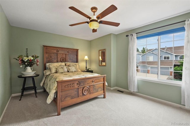 15962 W 70th Dr, Arvada, CO 80007 - bedroom with carpet flooring and a ceiling fan