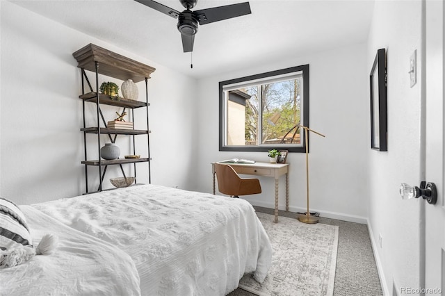 bedroom featuring baseboards, carpet, and a ceiling fan
