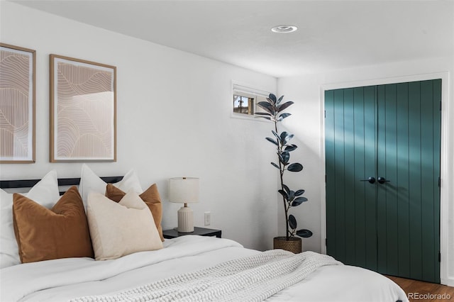 bedroom featuring wood finished floors