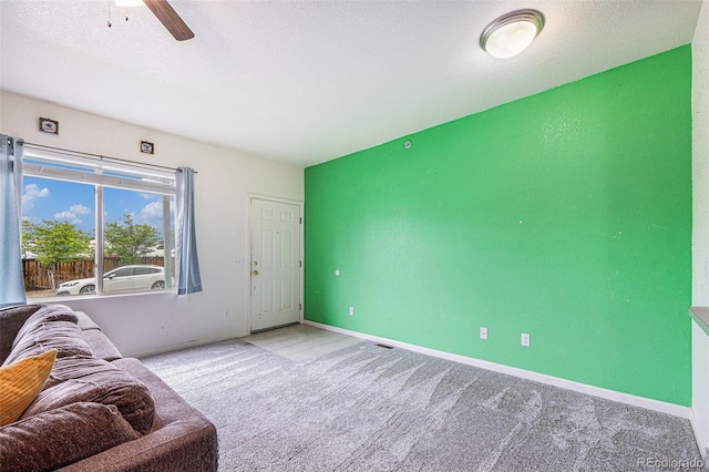 18038 Becket Dr, Parker, CO 80134 - carpeted living area with a ceiling fan and baseboards