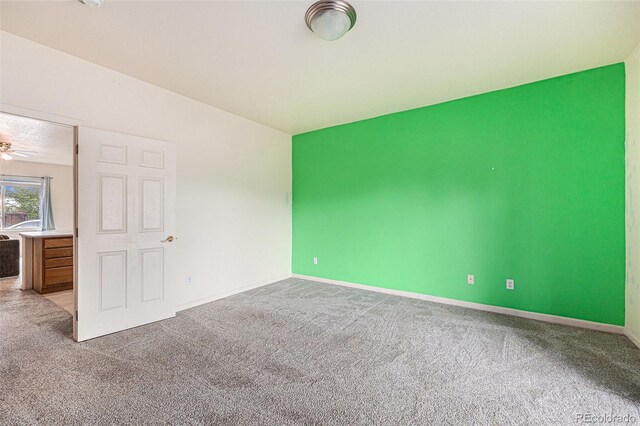 18038 Becket Dr, Parker, CO 80134 - carpeted spare room featuring baseboards