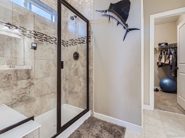 7845 S Flat Rock Way, Aurora, CO 80016 - full bathroom with a stall shower and a spacious closet