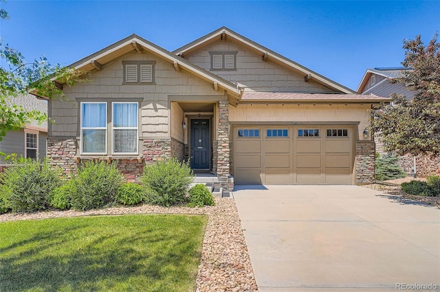 7845 S Flat Rock Way, Aurora, CO 80016 - view of front facade featuring stone siding, an attached garage, driveway, and a front yard