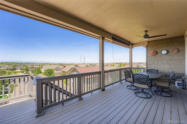 7845 S Flat Rock Way, Aurora, CO 80016 - deck with a residential view, outdoor dining area, and ceiling fan