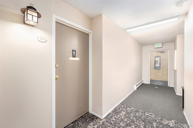 350 S Clinton St Unit 2A, Denver, CO 80247 - property entrance featuring a baseboard radiator